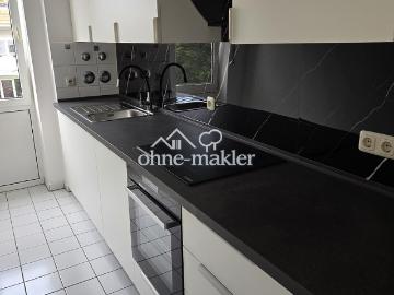 Freie, helle 2 Zimmer Wohnung mit neuer Einbauküche und kleinem Wintergarten