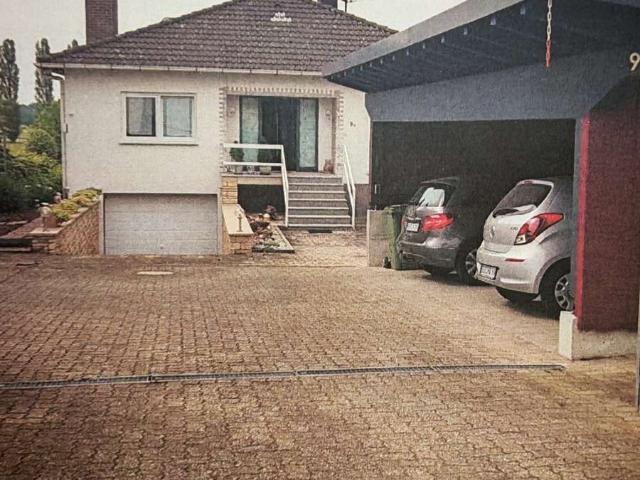 Freistehendes Einfamilienhaus mit Garten und Carport in Freckenfeld