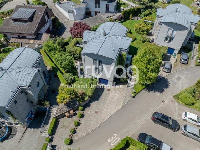 Freistehendes Einfamilienhaus mit Gartenoase