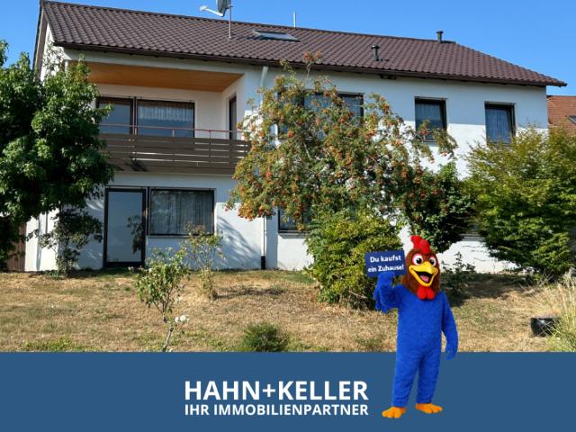 Freistehendes Einfamilienhaus mit ELW – 1.165 m² Grundstück und freie Aussicht