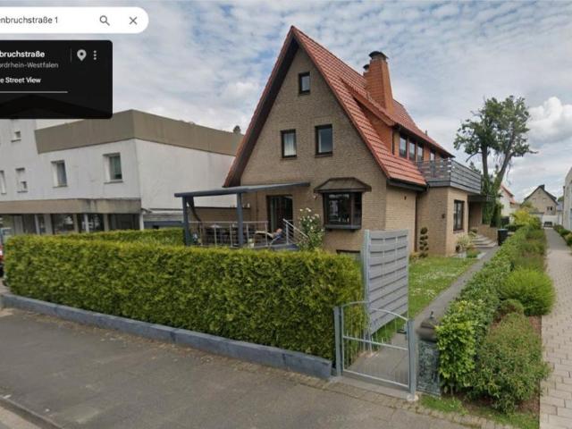 Freistehendes Einfamilienhaus mit Kamin und Garage in Spenge