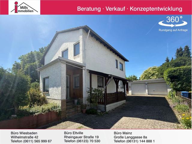 Freistehendes Einfamilienhaus mit schönem Garten in begehrter Feldrandlage von Oestrich Winkel