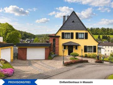 Freistehendes Einfamilienhaus mit Terrasse, zwei Garagen und Garten in ruhiger Wohnlage von Maxsain