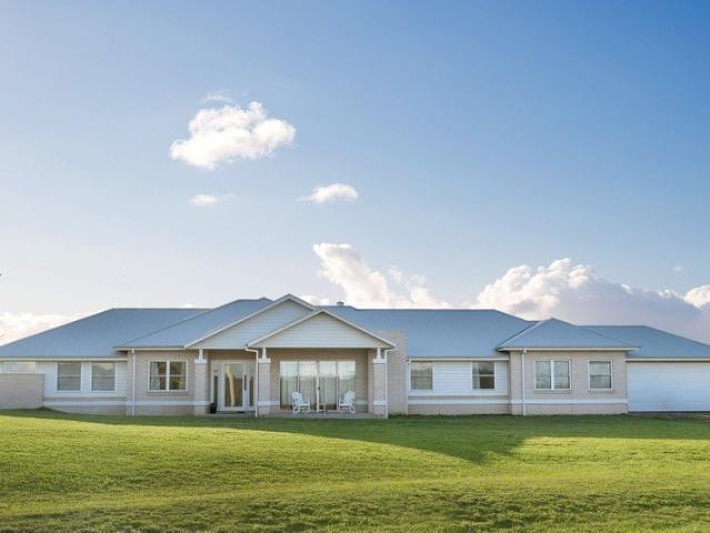 French Provincial Elegance Meets Acreage Living