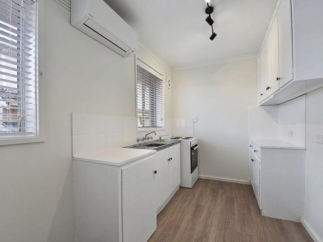 Fresh, Bright, and Low Maintenance Living!