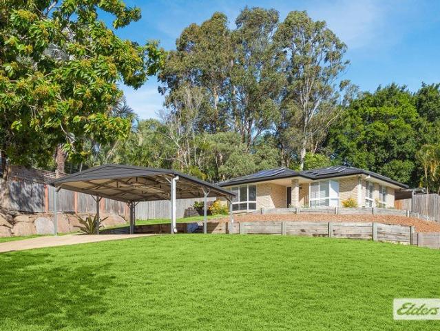 FRESH FAMILY HOME WITH SPACE, COMFORT & A HUGE BACKYARD!