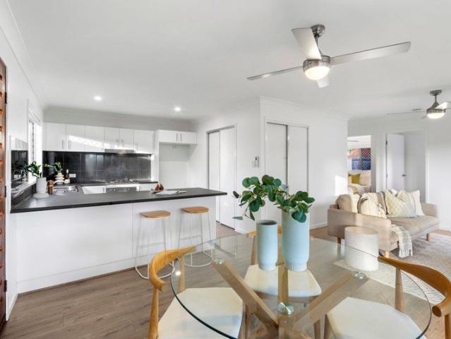 Fresh, Modern & Effortless Near New Living in Prime Location