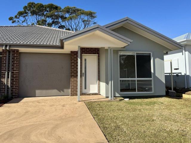 Fresh, Modern Living in a Brand New Duplex!