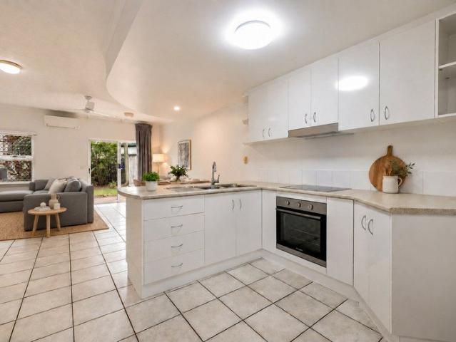 Fresh & Move in Ready | 2 Bed, 2 Bath Townhouse with Attached Car Accommodation