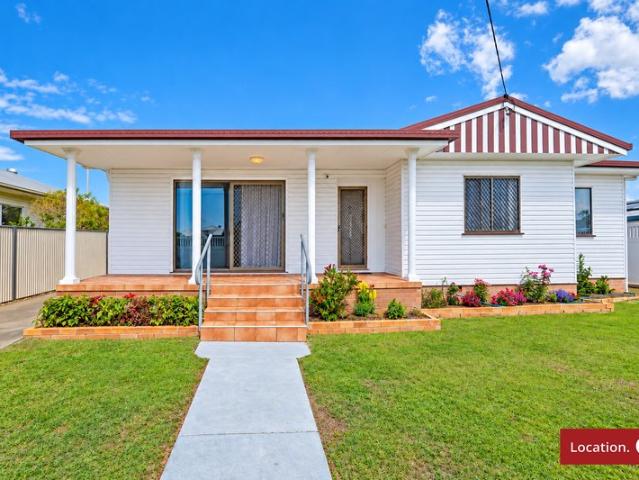 Fresh, Spacious & Packed With Potential on 1,358m² Grounds with 4 Bay Shed!