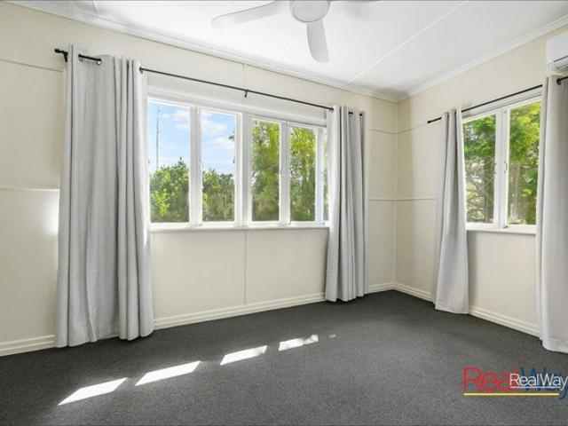 Freshened Up Cottage Home with Large Back Yard