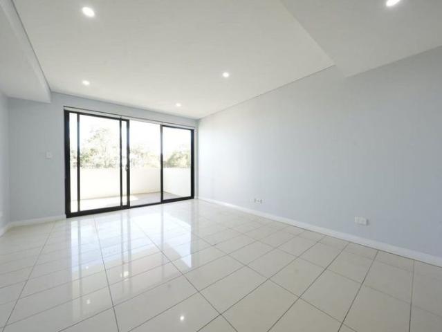 Freshly Painted 2 Bedroom Apartment with Brand New Carpet For LEASE