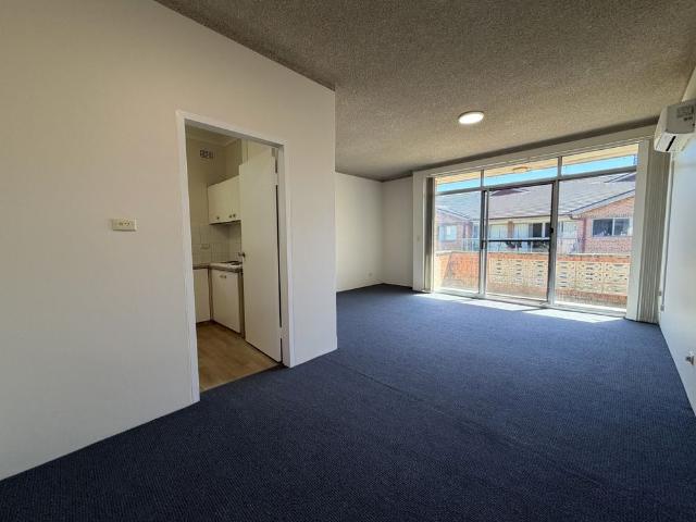 Freshly Painted 2 Bedroom Unit with Swimming Pool