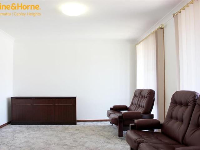 FRESHLY PAINTED 4 BEDROOM BRICK HOME!