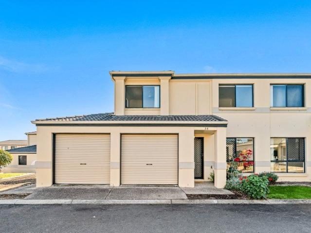 Freshly Painted Corner Townhouse with Double Garage & North/South Aspect