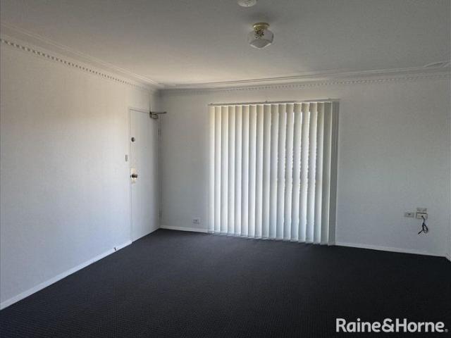 Freshly Painted and New Carpet Two Bedroom Unit