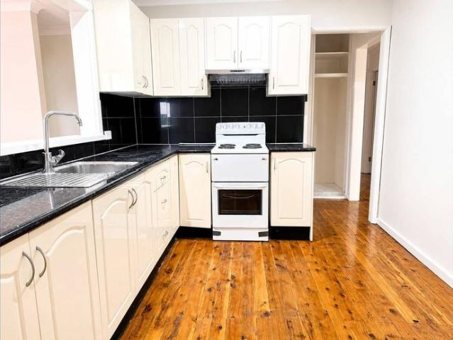 Freshly Painted Four Bedroom Home!