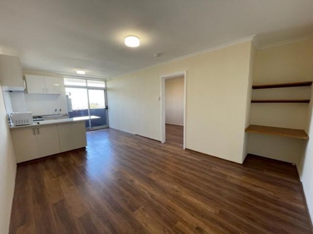 Freshly Painted Fifth Floor Gem with Balcony Views