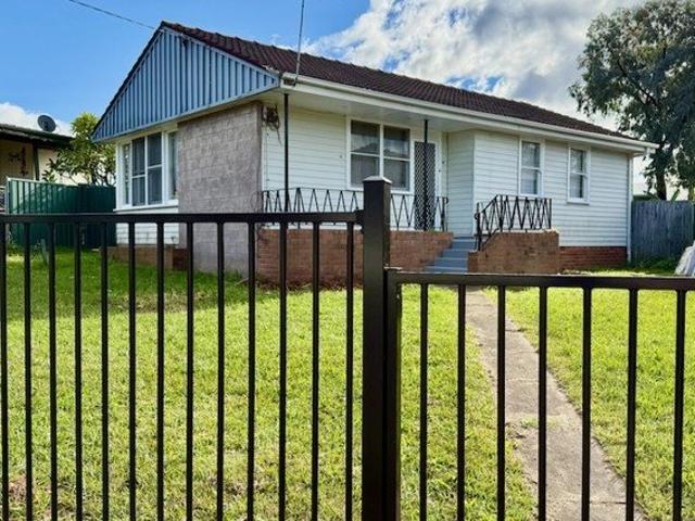 FRESHLY PAINTED HOME IN A CONVENIENT LOCATION