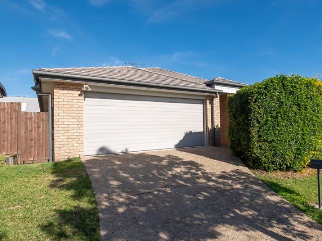 Freshly Painted, New Carpets Quality Family Abode is Ready and Waiting for You to Call Home