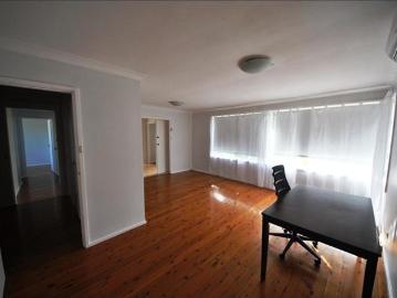 FRESHLY PAINTED SPACIOUS BRICK HOME