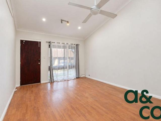Freshly Painted Townhouse Perfectly Located!