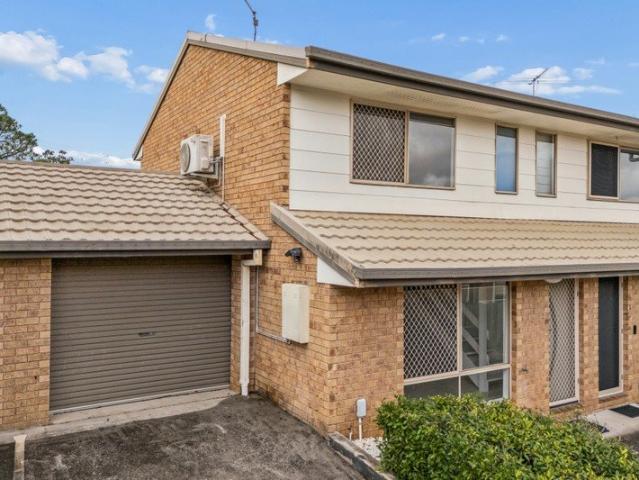 Freshly Painted Townhouse with Low Maintenance Living