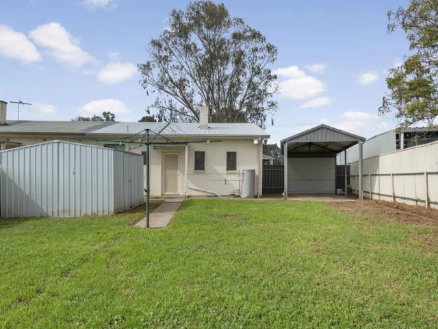 Freshly Painted Three Bedroom Home