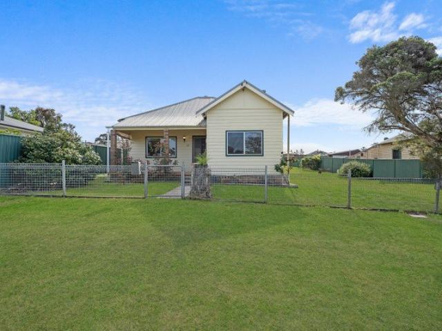 Freshly Painted Three Bedroom Home