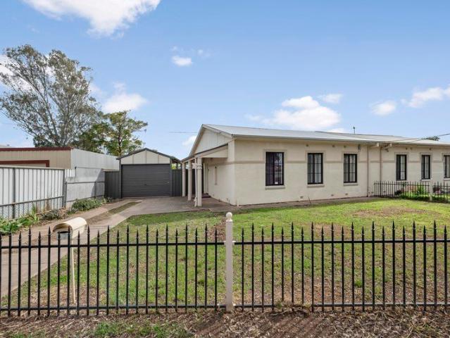 Freshly Painted Three Bedroom Home