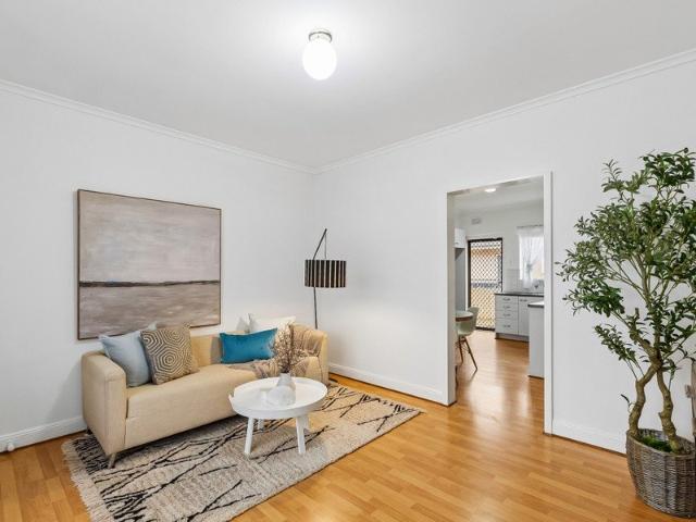 Freshly Painted Two Bedroom Unit with Balcony & Carport