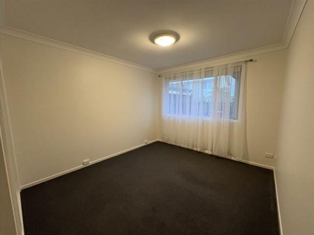 Freshly Painted Unit Walk to Town