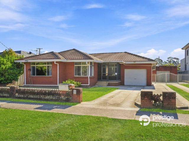 freshly renovated 4 bedroom home with garage & dual driveways