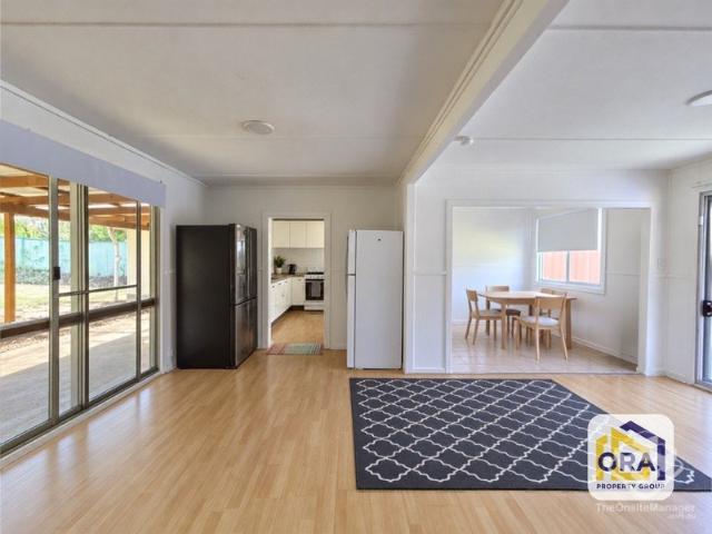 FRESHLY RENOVATED 4 BEDROOM HOME + BONUS STORAGE CONTAINER!