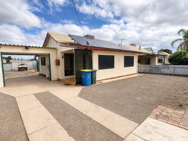 Freshly Renovated 3 Bedroom Home with Huge Workshop & Parking
