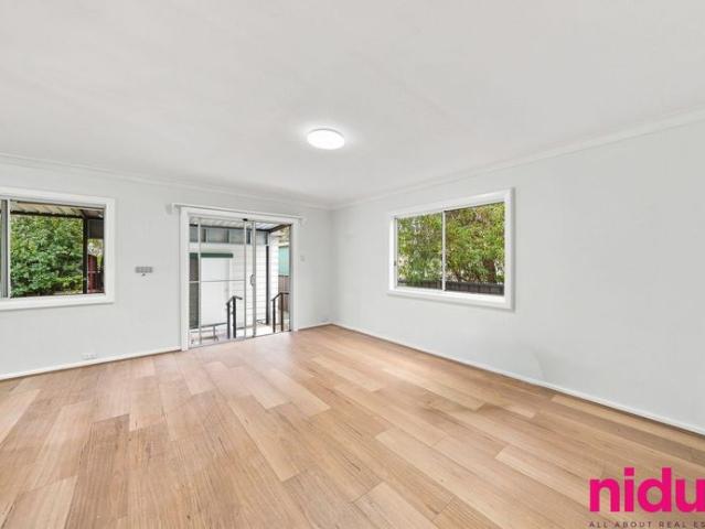 Freshly Renovated Three Bedroom Home with Air Conditioned Rear Retreat