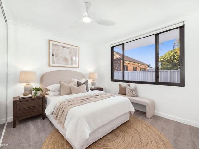 Freshly Renovated Two Bedroom Apartment with Huge Private Courtyard!