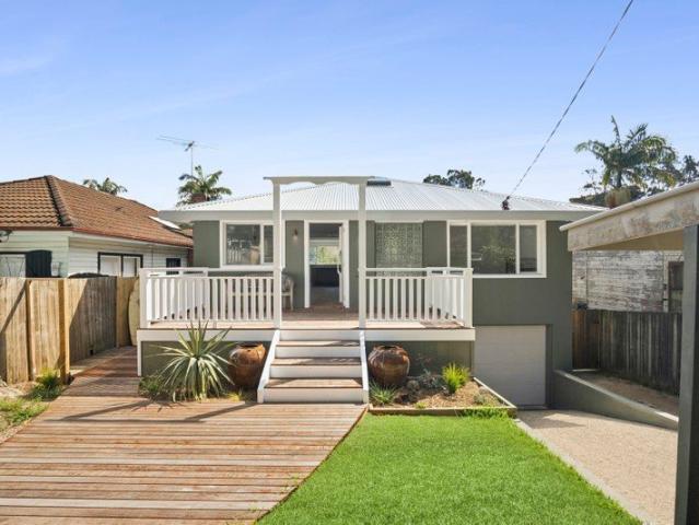 Freshly Renovated Upper Duplex with Coastal Lifestyle Appeal Utilities Included