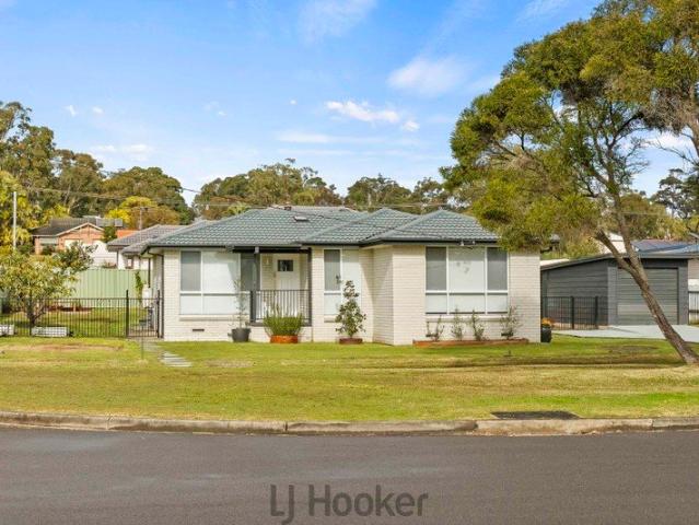 Freshly Renovated Family Living in Sought After Rosemary Row