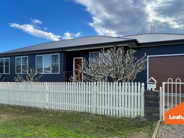 Freshly Renovated Four Bedroom Home Moments from Redhead Beach