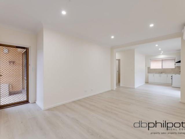 Freshly Renovated Living with Your Own Private Yard!