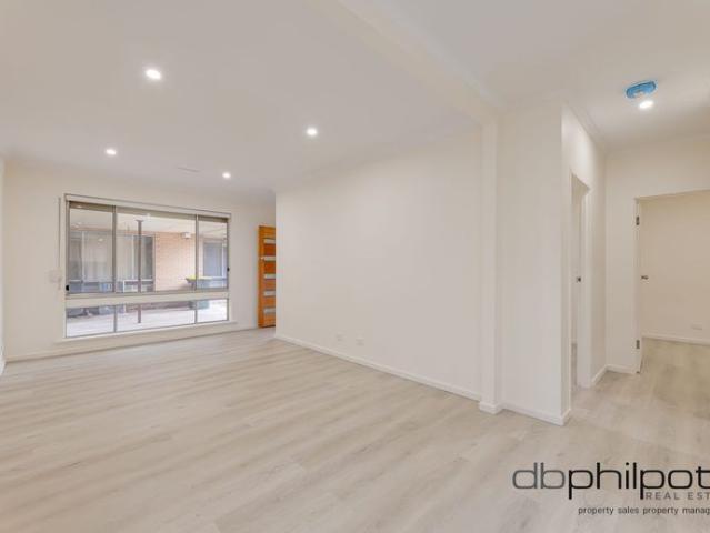 Freshly Renovated Living with Your Own Private Yard!