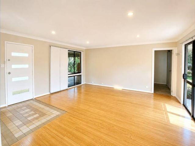 Freshly Repainted 4 Bedroom Home with Spacious Yard