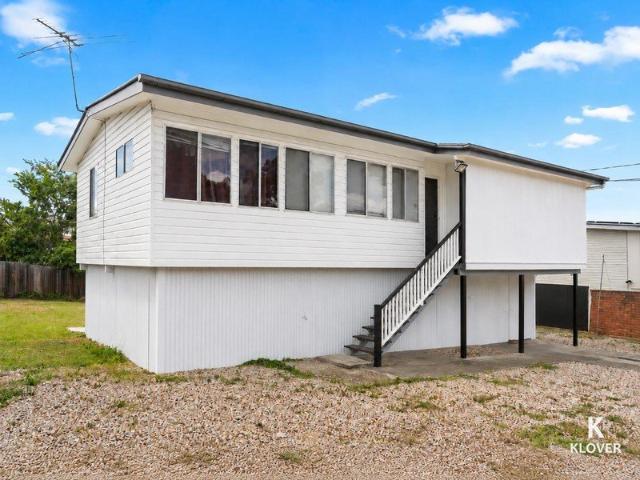 Freshly Updated 3 Bedroom Home in Convenient Logan Central!