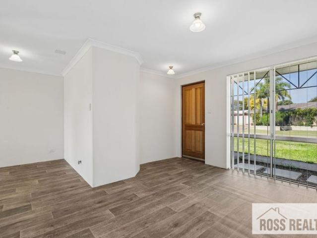 FRESHLY UPDATED 3 BEDROOM HOME WITH LARGE BACKYARD