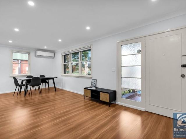 FRESHLY UPDATED FAMILY HOME IN A QUIET CUL DE SAC