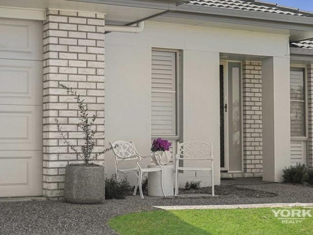FRESHLY UPDATED FAMILY HOME READY TO MOVE IN