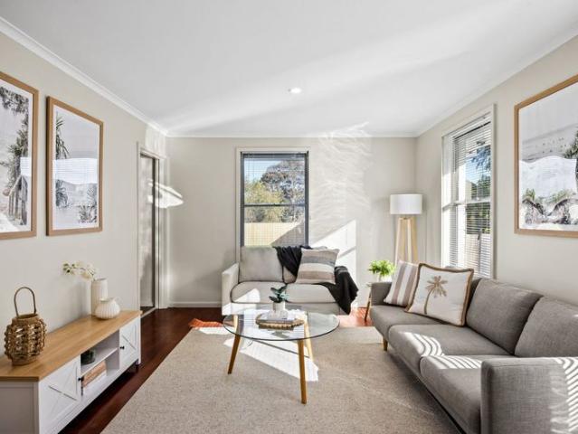 Freshly Updated Family Home with a Glimpse of the Bay