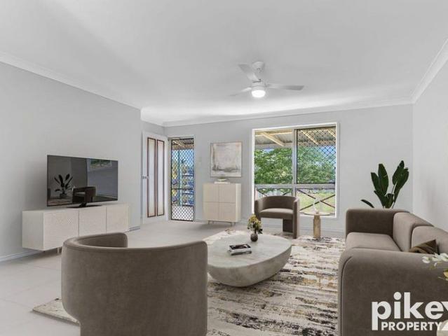 Freshly Updated Family Home with Huge Outdoor Entertaining Area & Shed!