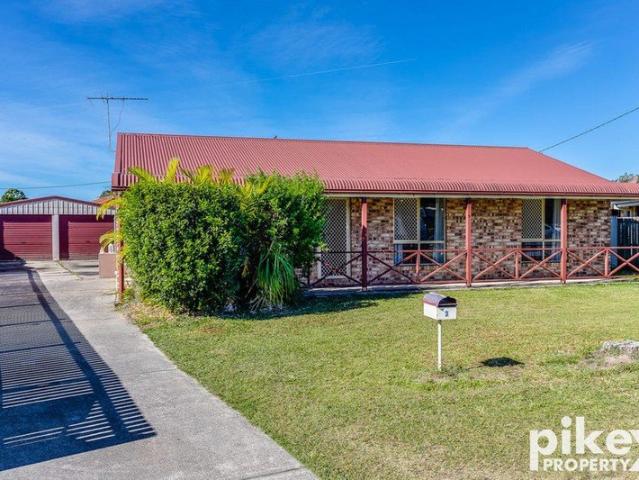Freshly Updated Family Home with Huge Outdoor Entertaining Area & Shed!